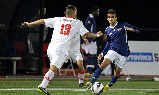 SFU's Ryan Dhillon (12) contributed one of the Clan's five goals in a bold 5-0 victory in round one of the 2013 Division II West Region playoffs.